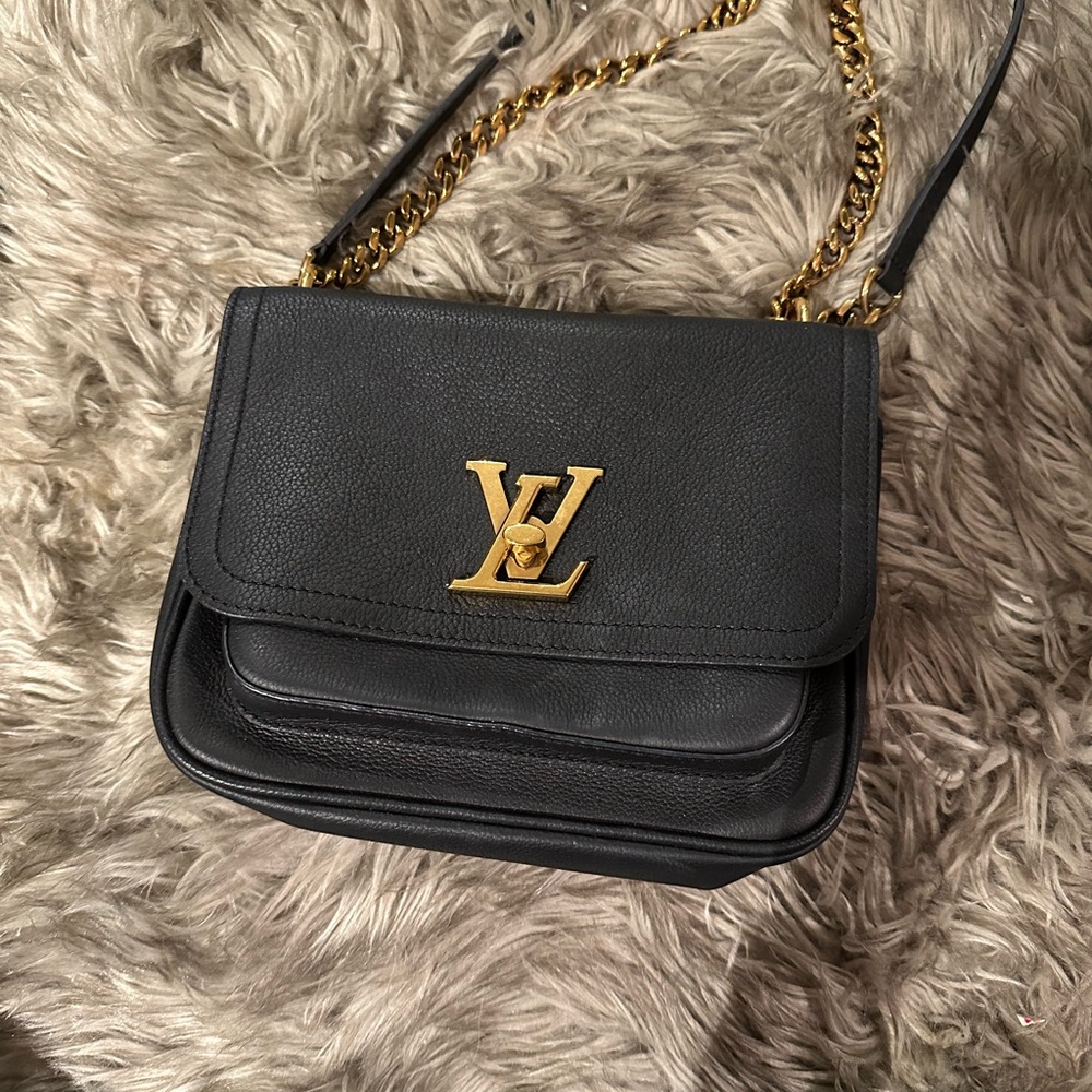Louis Vuitton Black and Gold Crossbody Bag with Timeless Elegance
